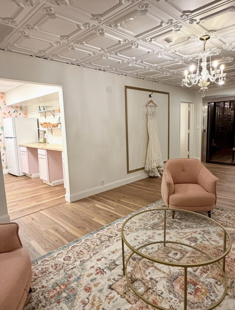 Bridal suite with wedding dress and kitchenette at The Event Vault