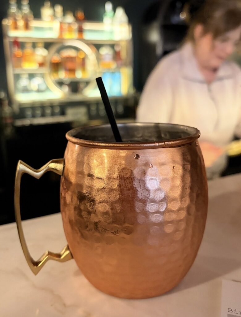 Copper mug cocktail served at The Event Vault bar
