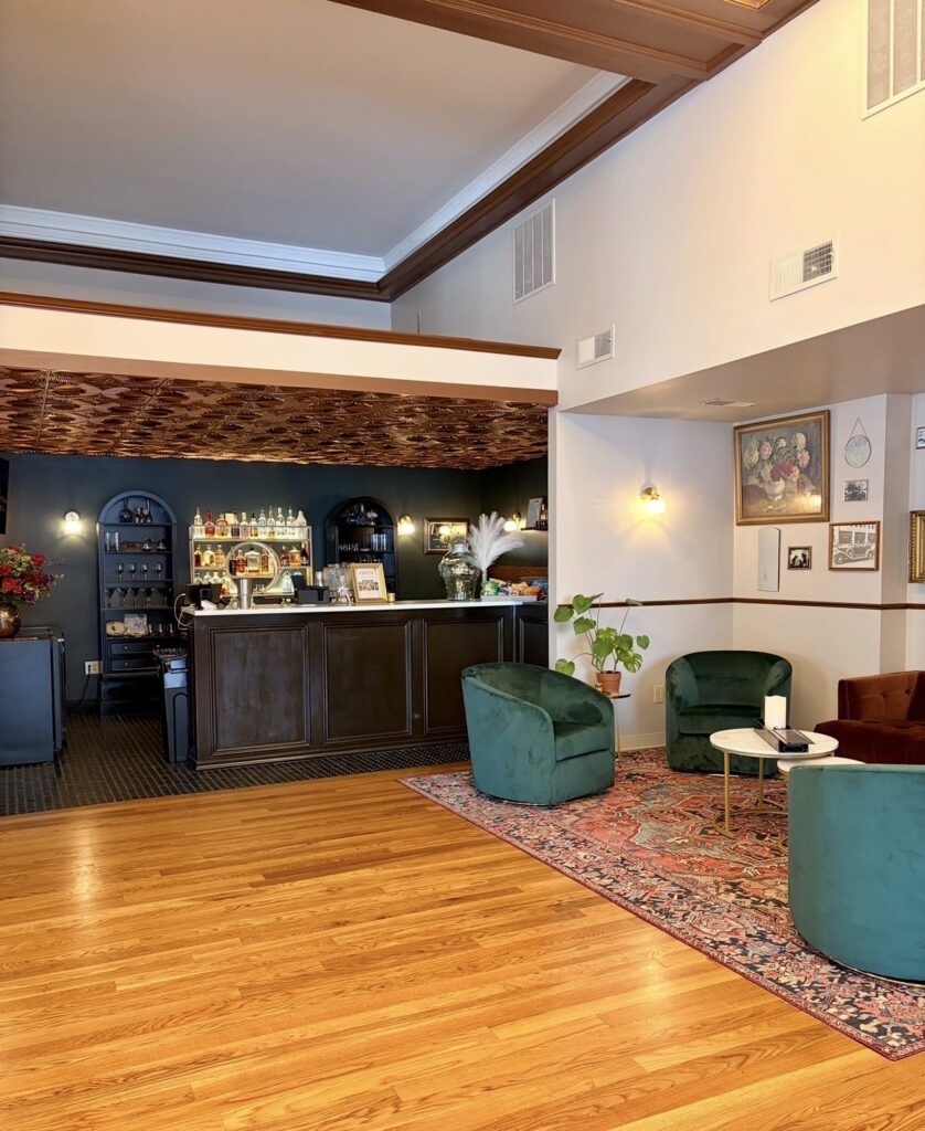 Lounge seating with the bar in the background at The Event Vault