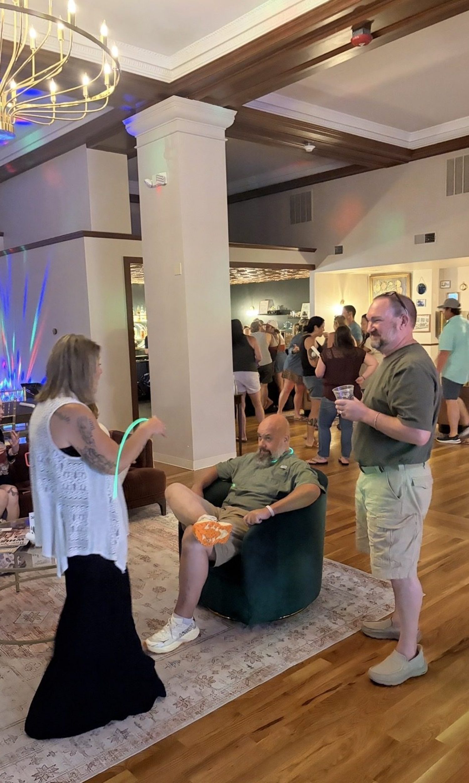 Guests mingling under party lights at a birthday event at The Event Vault