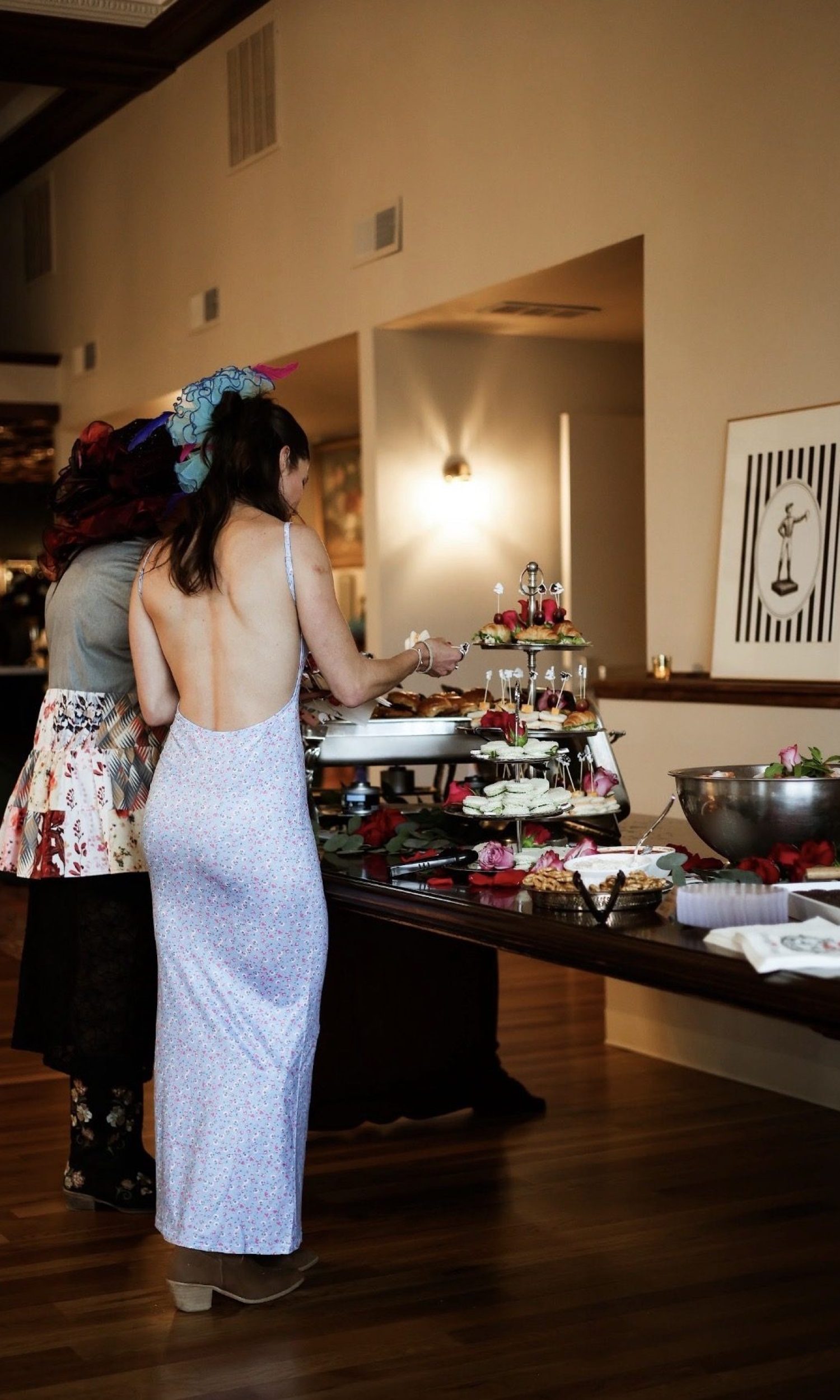 Guests serving themselves at the buffet during a Derby party at The Event Vault