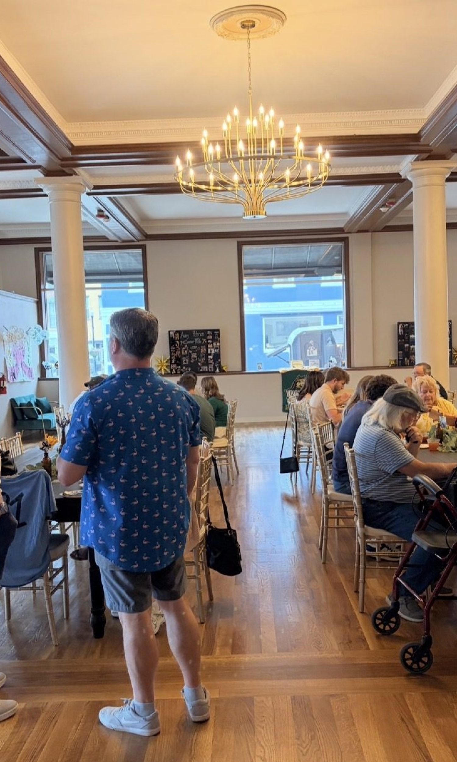 Daytime community event with guests at tables at The Event Vault