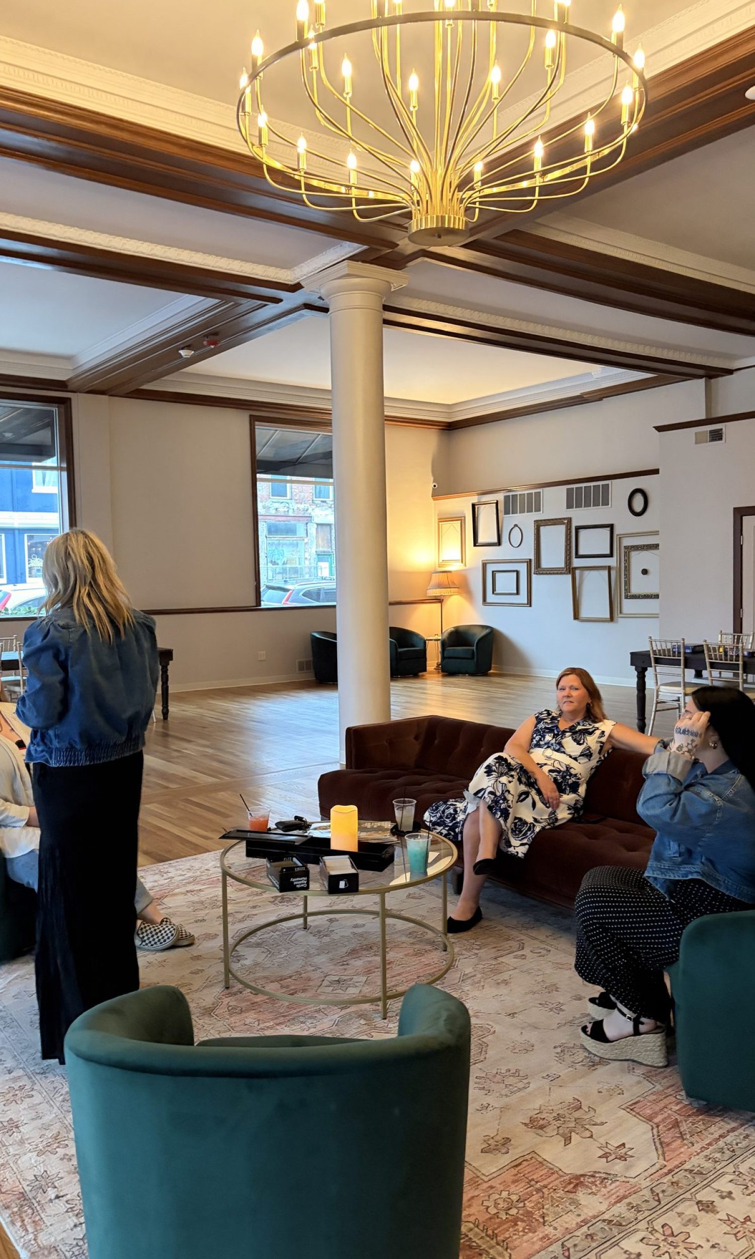 Small group meeting in the lounge seating area at The Event Vault