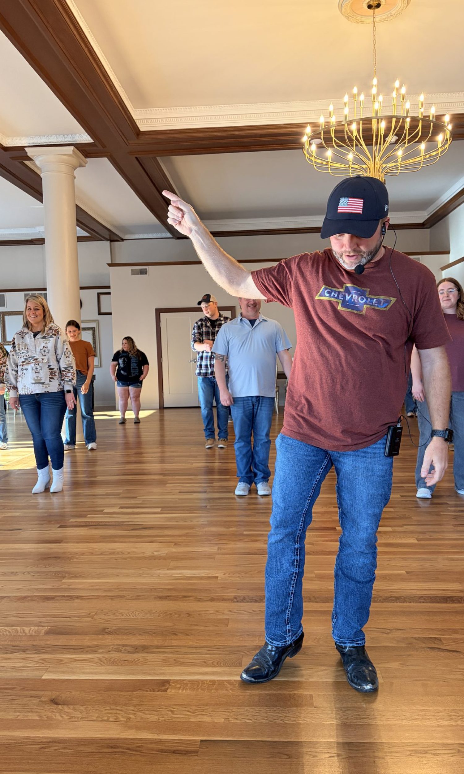 Guests on the hardwood dance floor at The Event Vault